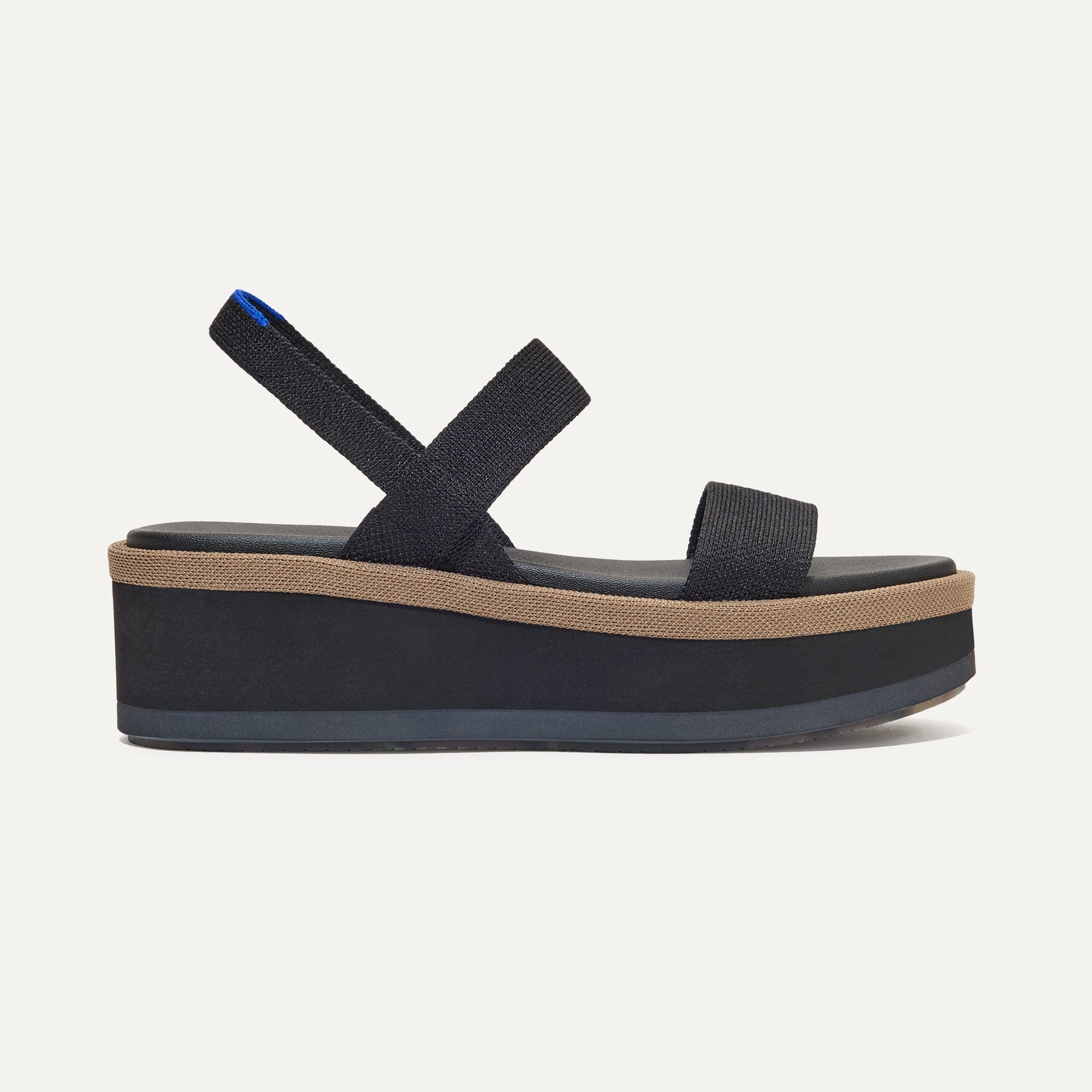 The Lightweight Wedge Sandal in Pepper shown from the side.