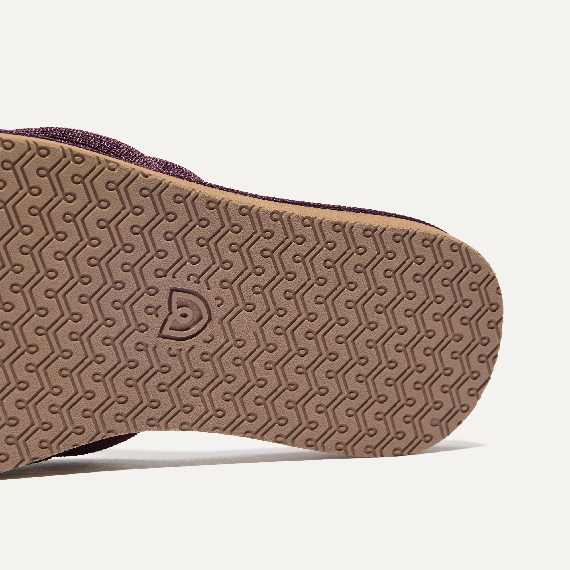 Close up of the outsole of The Summer Sandal in Blackberry.