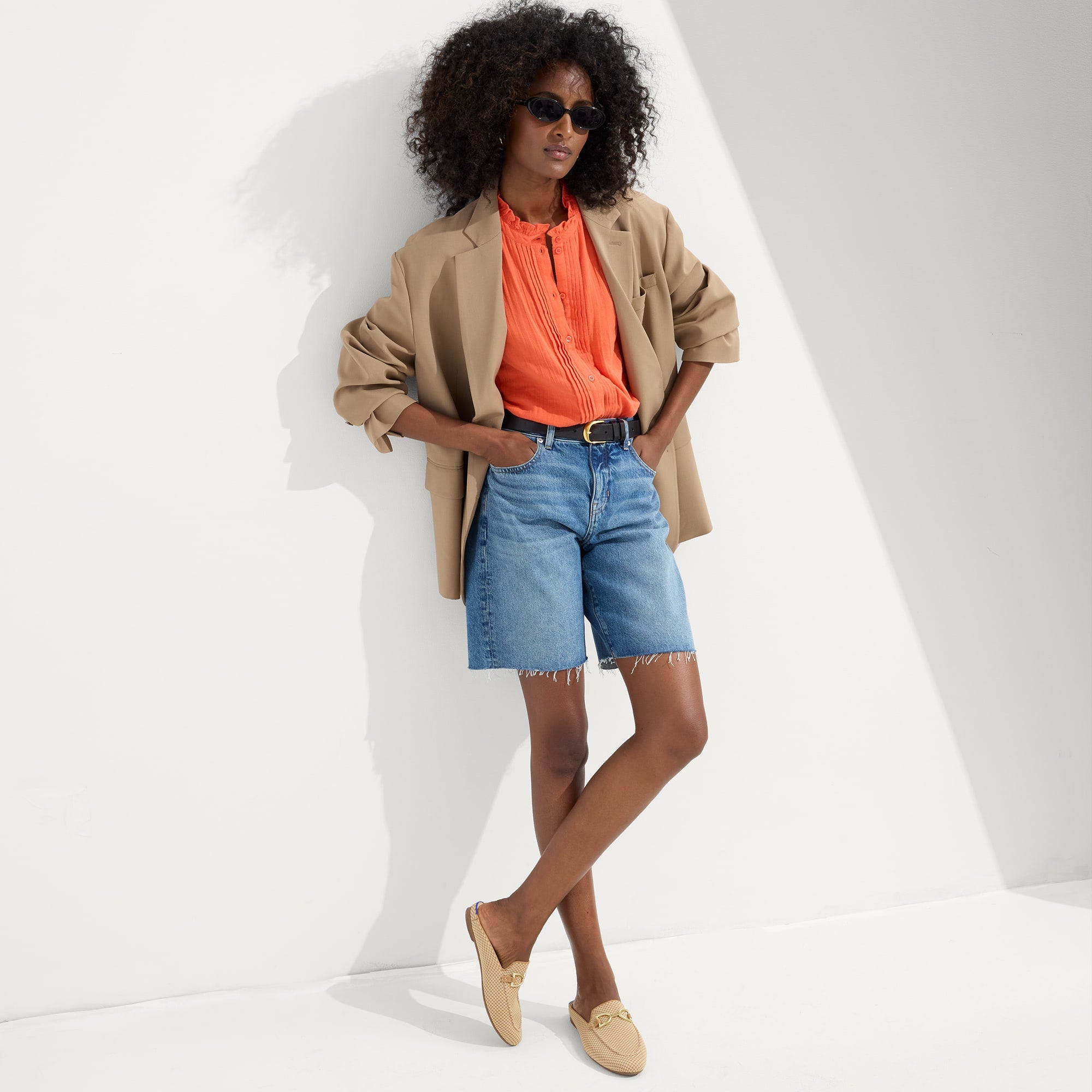Alternate view of a model wearing The Double Bit Loafer Mule in Waffle Micro Check.