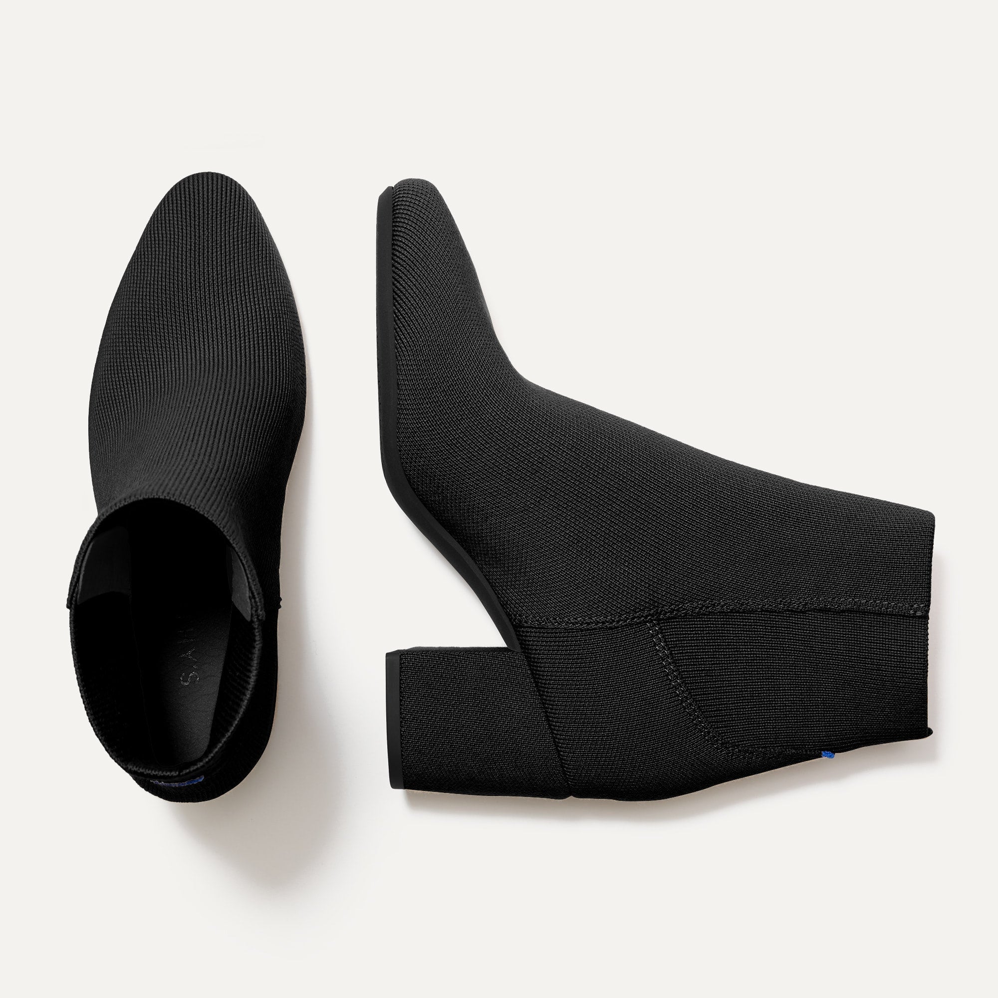 A pair of The High Classic Boot in Black shown from the top.