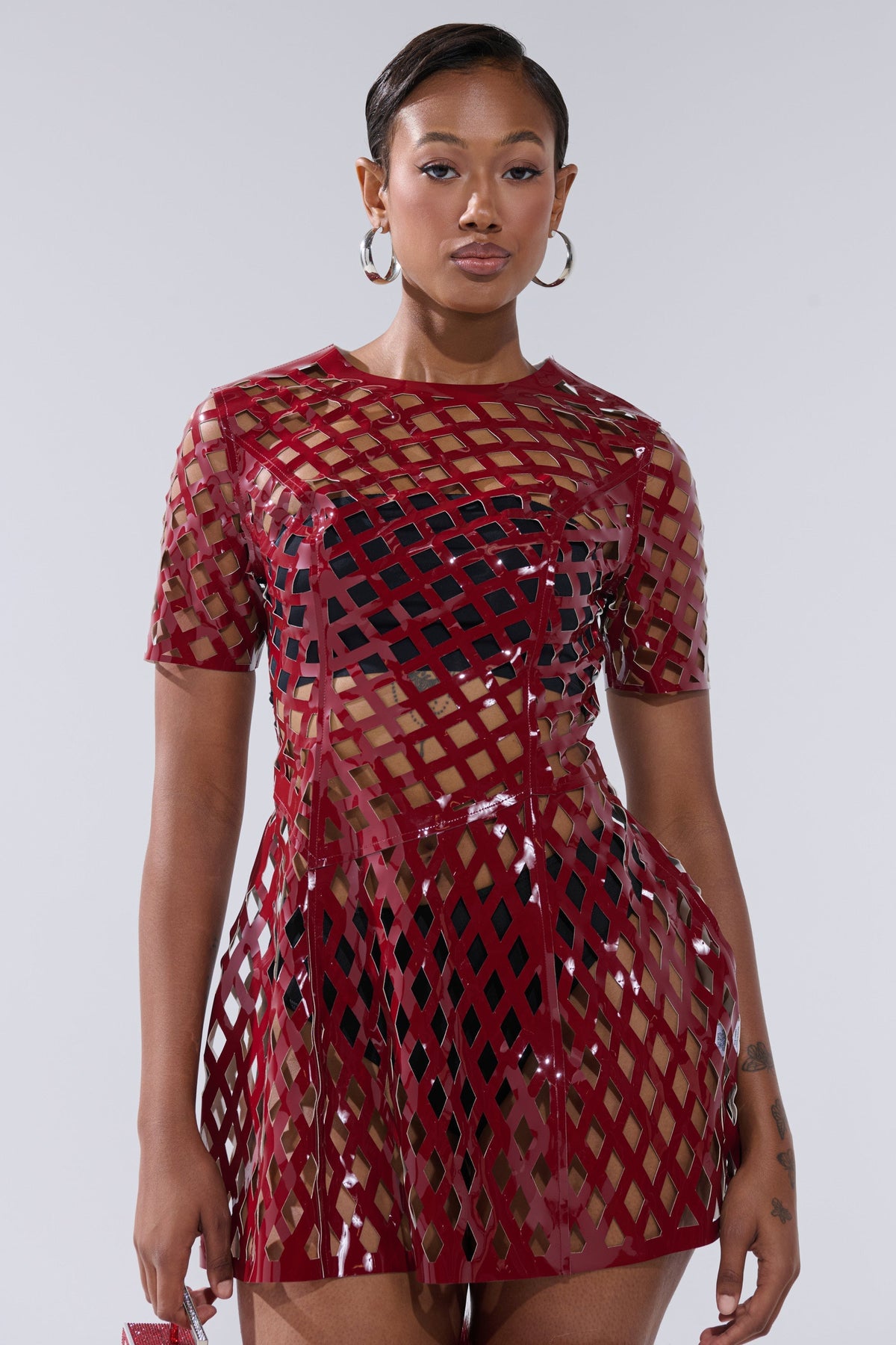 SHE'S DIFFERENT CUT OUT FAUX LEATHER MINI DRESS IN BURGUNDY