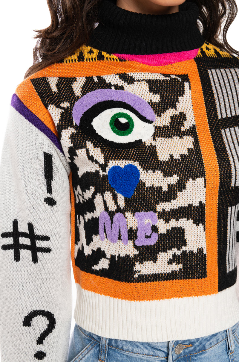EYES ON ME GRAPHIC TURTLENECK SWEATER